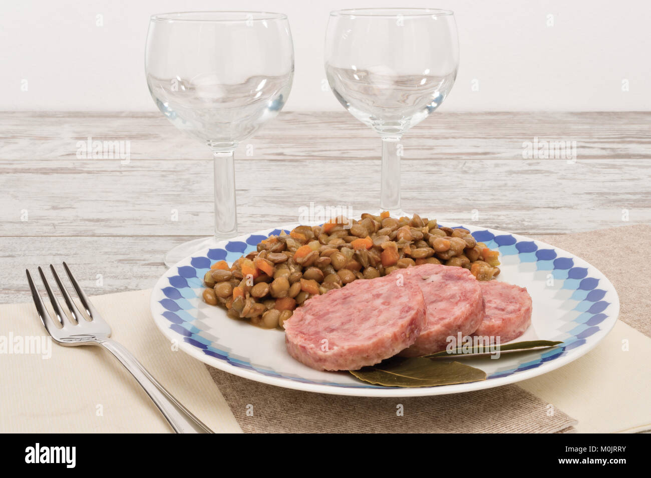 pork sausage slices and lentils 3 Stock Photo Alamy