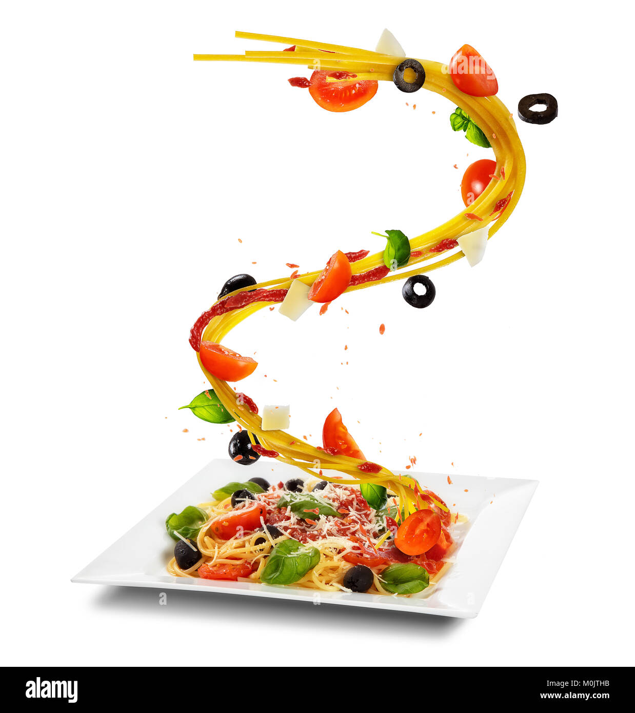 Concept of flying food with plate and traditional italian pasta with