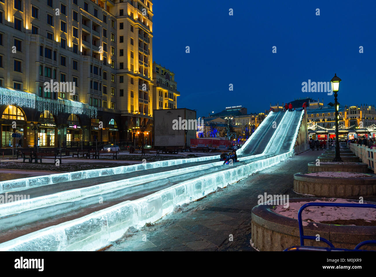 Moscow, Russia - January 10. 2018. Ice slide on Manezhnaya Square as part of festival - trip to Christmas Stock Photo