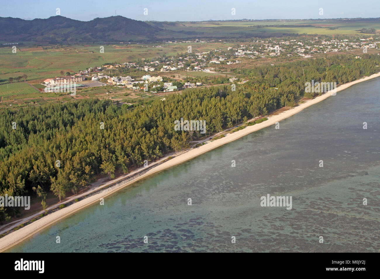 Village near beach seen from helicopter, Savanne district, Republic of Mauritius. Stock Photo
