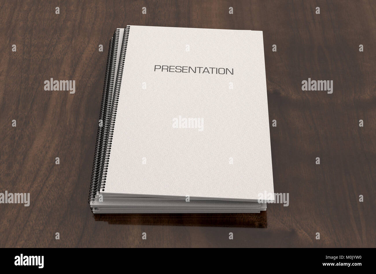 A pile of wire bound presentation documents in a pile on a boardroom table surface - 3D render Stock Photo