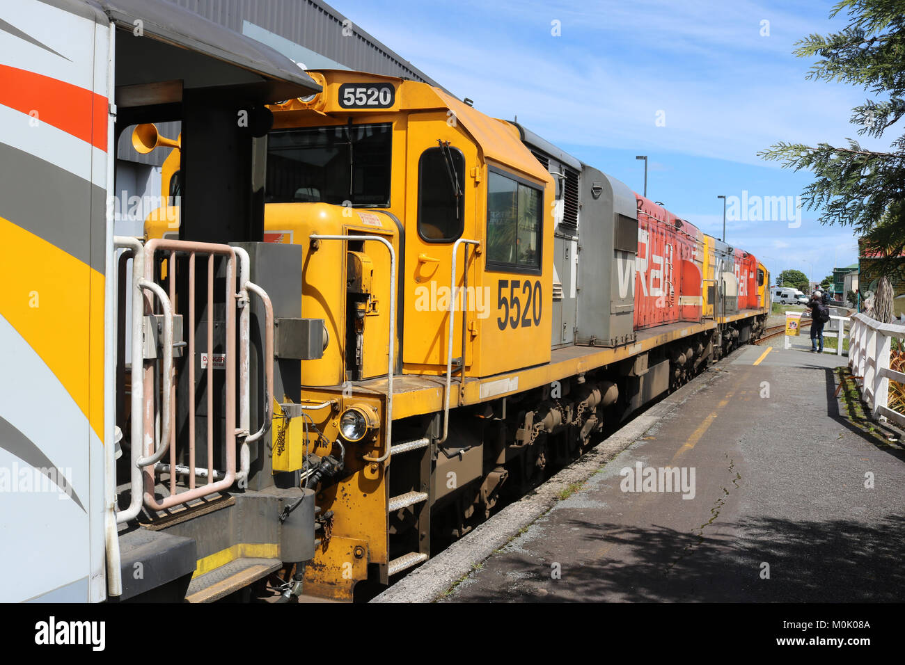Two class DSX diesel-electric locomotives at front of Trans Alpine Express train in Greymouth railway station, South Island, New Zealand. Stock Photo