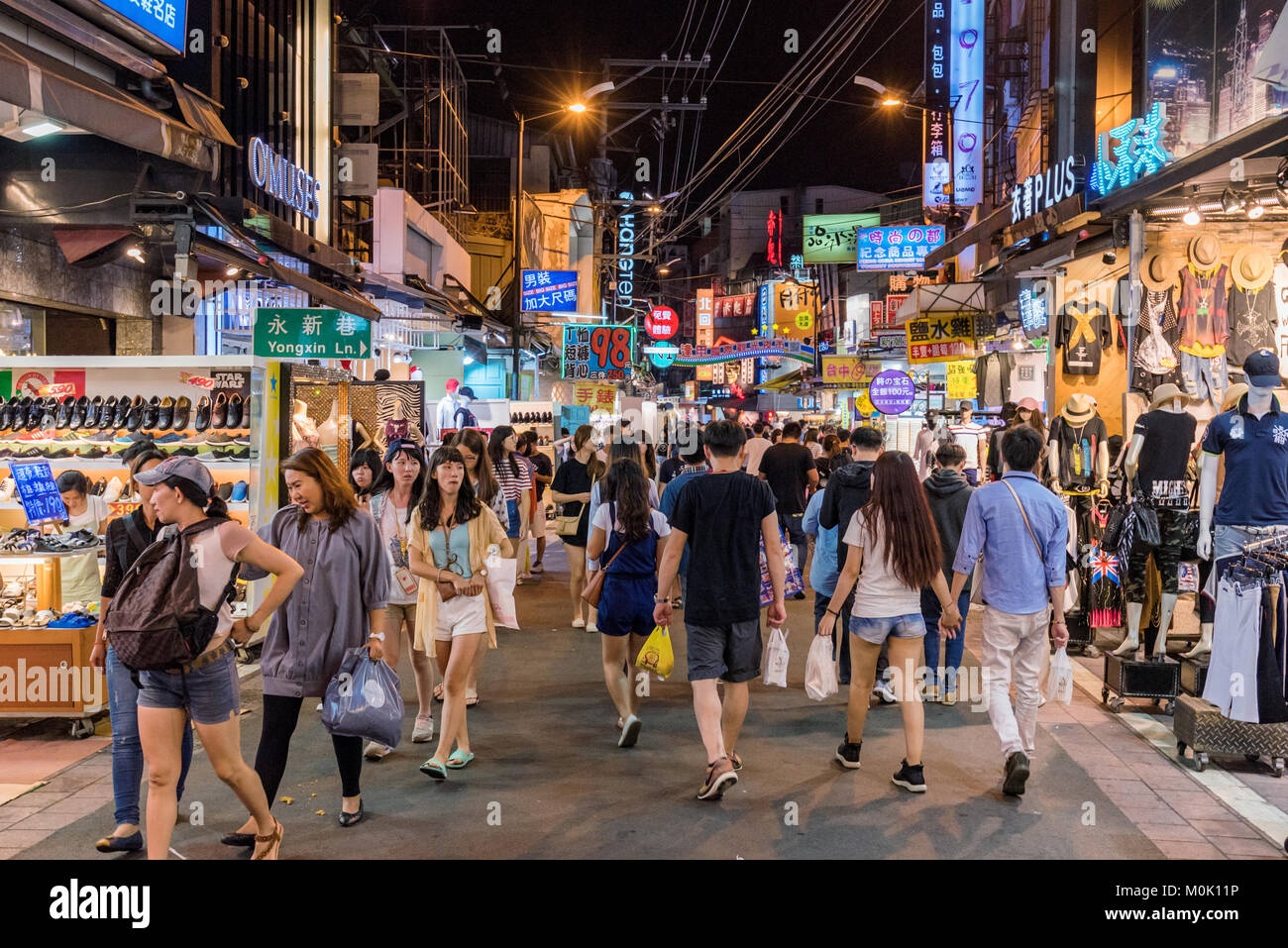 TAICHUNG, TAIWAN - JULY 18: This is a street in Fengjia night market the largest night market in Taiwan which is popular with tourists and locals on J Stock Photo