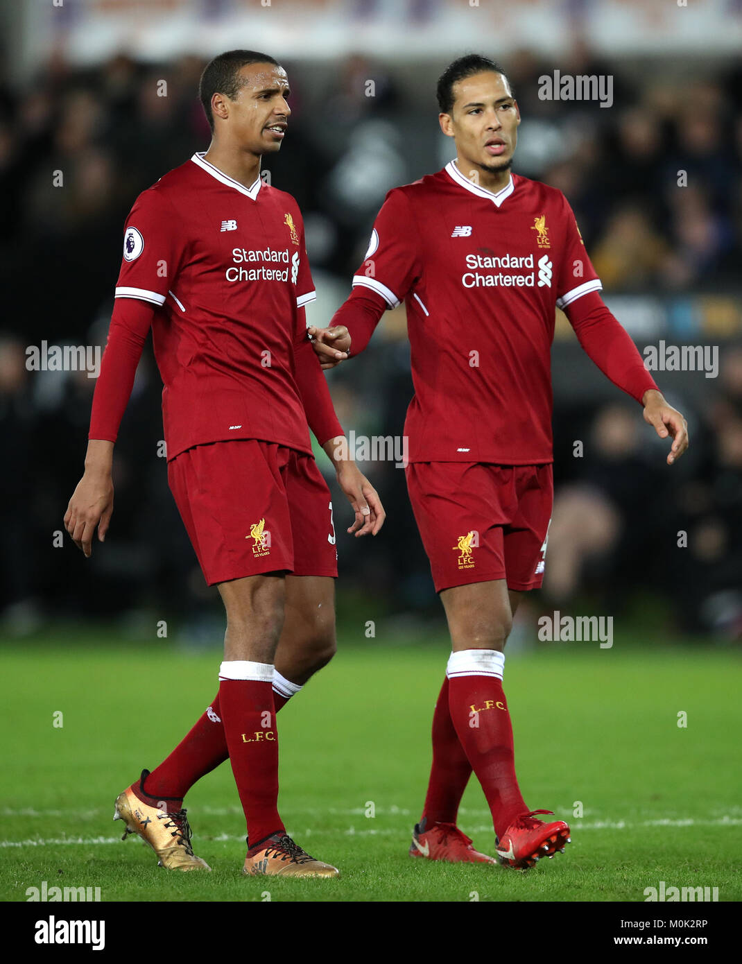 Liverpool's Joel Matip (left) and Virgil van Dijk during the Premier League match at the Liberty Stadium, Swansea. PRESS ASSOCIATION Photo. Picture date: Monday January 22, 2018. See PA story SOCCER Swansea. Photo credit should read: Nick Potts/PA Wire. RESTRICTIONS: EDITORIAL USE ONLY No use with unauthorised audio, video, data, fixture lists, club/league logos or 'live' services. Online in-match use limited to 75 images, no video emulation. No use in betting, games or single club/league/player publications. Stock Photo