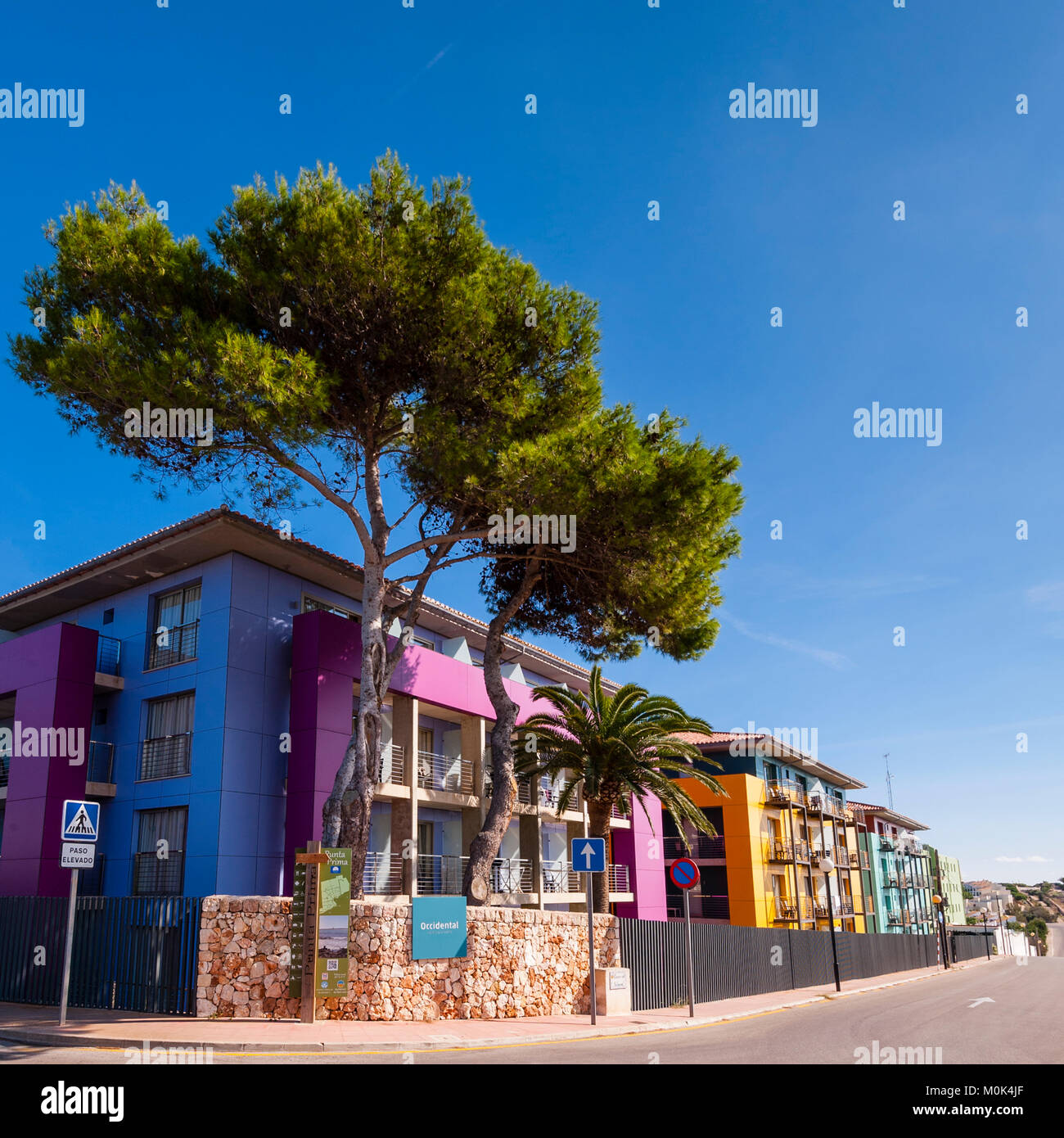Colourful holiday appartments at Punta Prima , Menorca , Balearic Islands , Spain Stock Photo
