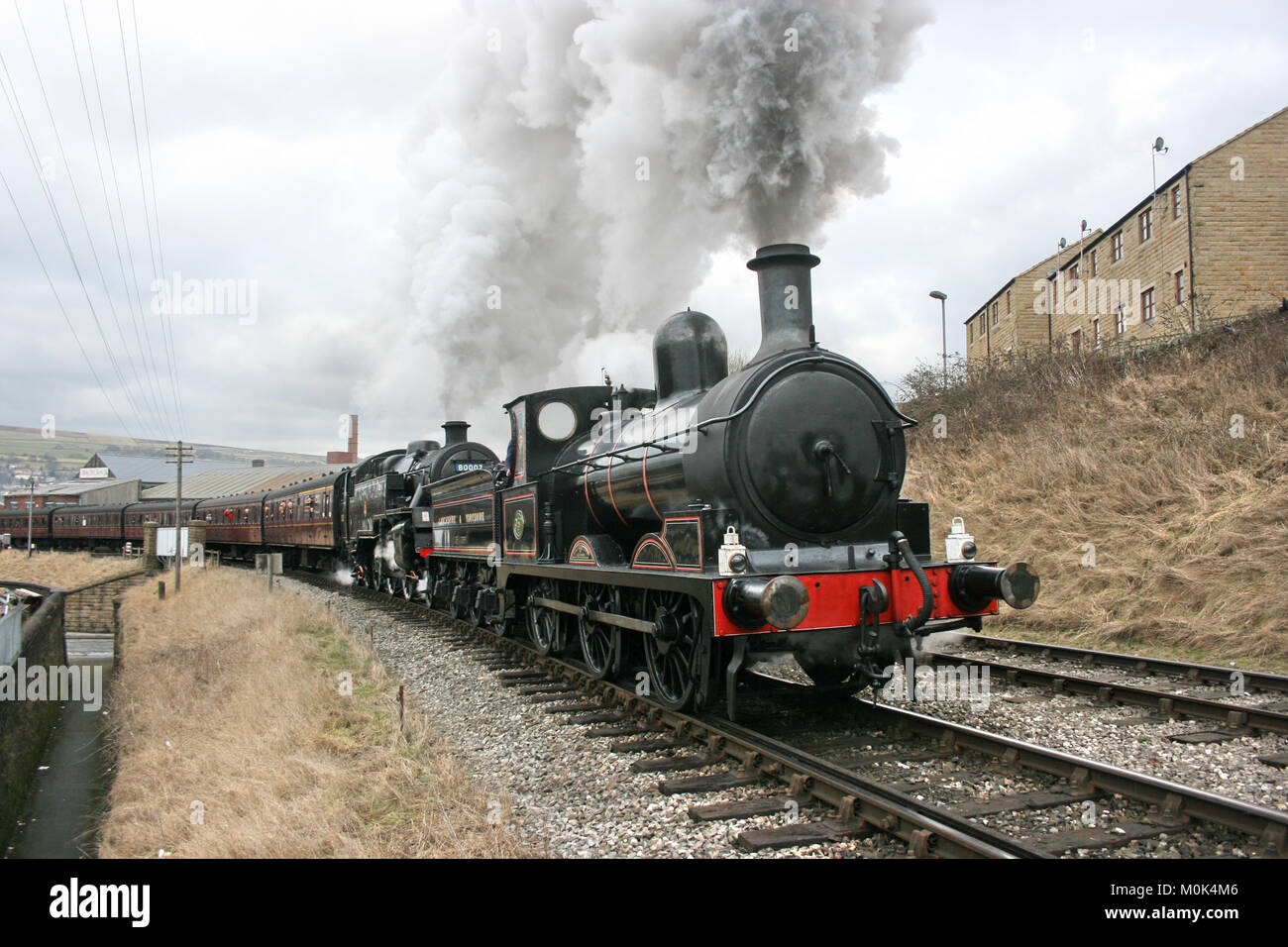 Lancashire and Yorkshire Steam Loco and Standard 4 steam loco at the Keighley and Worth Valley Railway - Keighley, West Yorkshire, UK - 14th February  Stock Photo