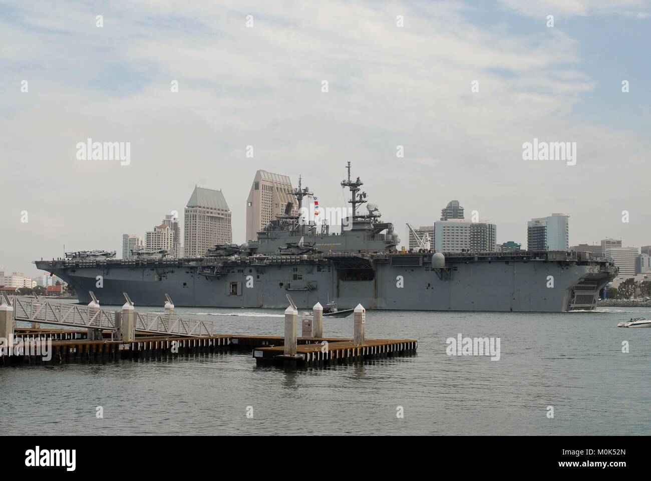 The U.S. Navy Wasp-class amphibious assault ship USS Boxer transits through the San Diego Bay July 26, 2013 in San Diego, California. Stock Photo