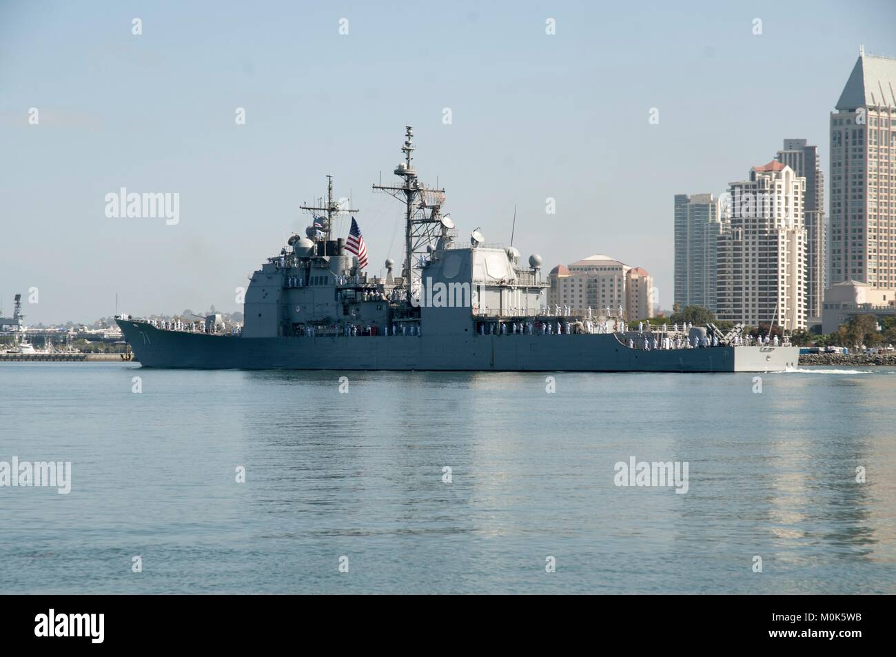 The U.S. Navy Ticonderoga-class guided-missile cruiser USS Cape St. George departs the Naval Base San Diego June 16, 2014 in San Diego, California. Stock Photo