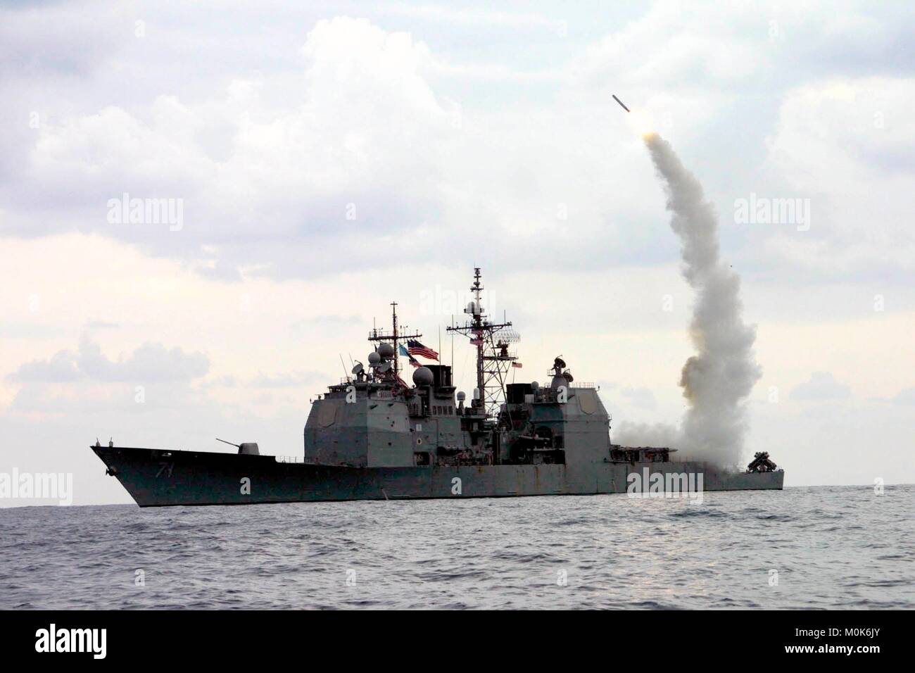 A Tomahawk cruise missile launches form the U.S. Navy Ticonderoga-class guided-missile cruiser USS Cape St. George March 23, 2003 in the Mediterranean Sea. Stock Photo