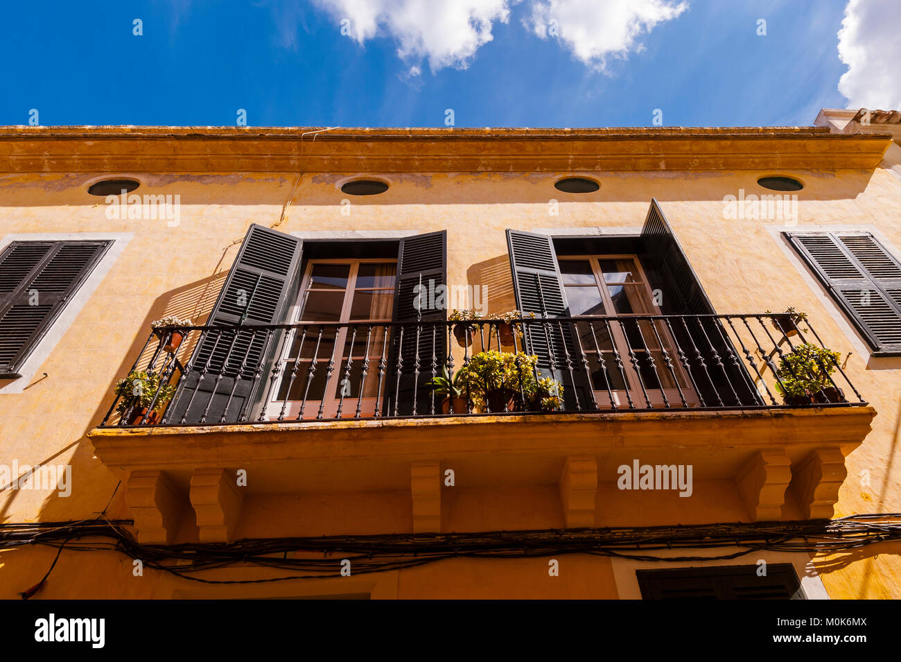 A pretty balcony in Ciutadella de Menorca , Menorca , Balearic Islands , Spain Stock Photo