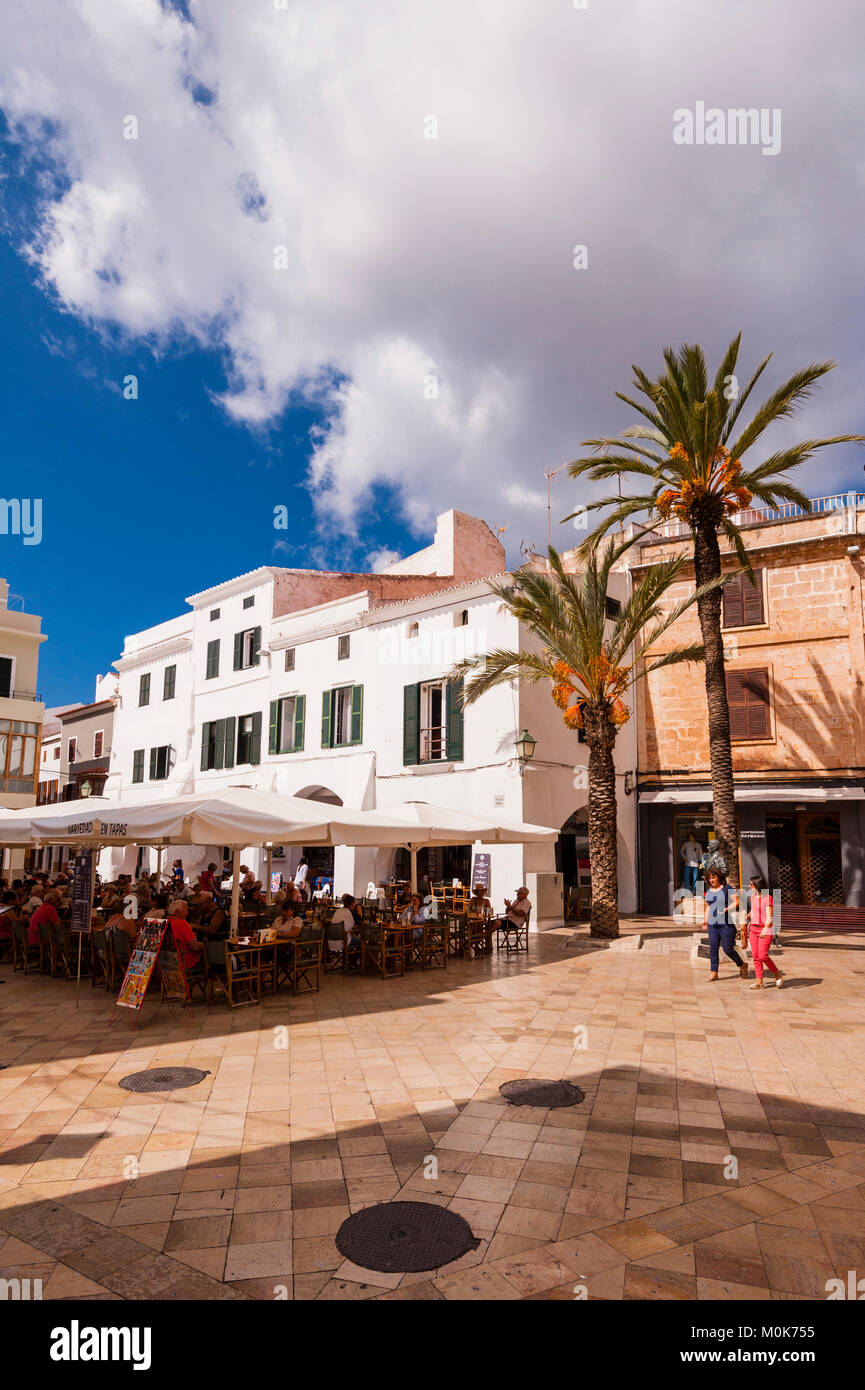 People sitting outside a bar in Ciutadella de Menorca , Menorca , Balearic Islands , Spain Stock Photo