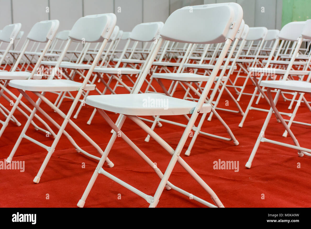 closeup photo of white chairs Stock Photo Alamy