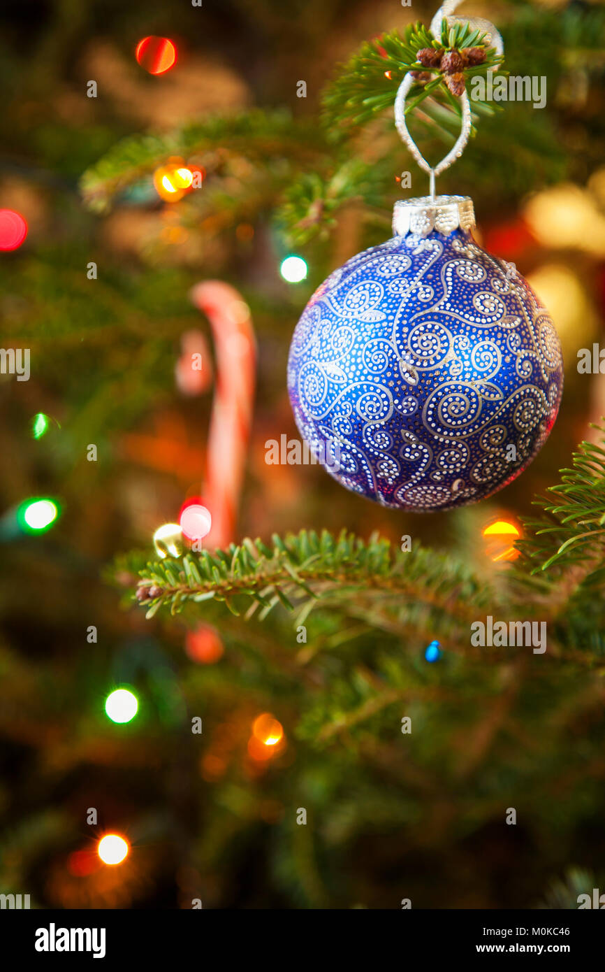 Handpainted blue Christmas bauble on a Christmas tree; Waco, Texas