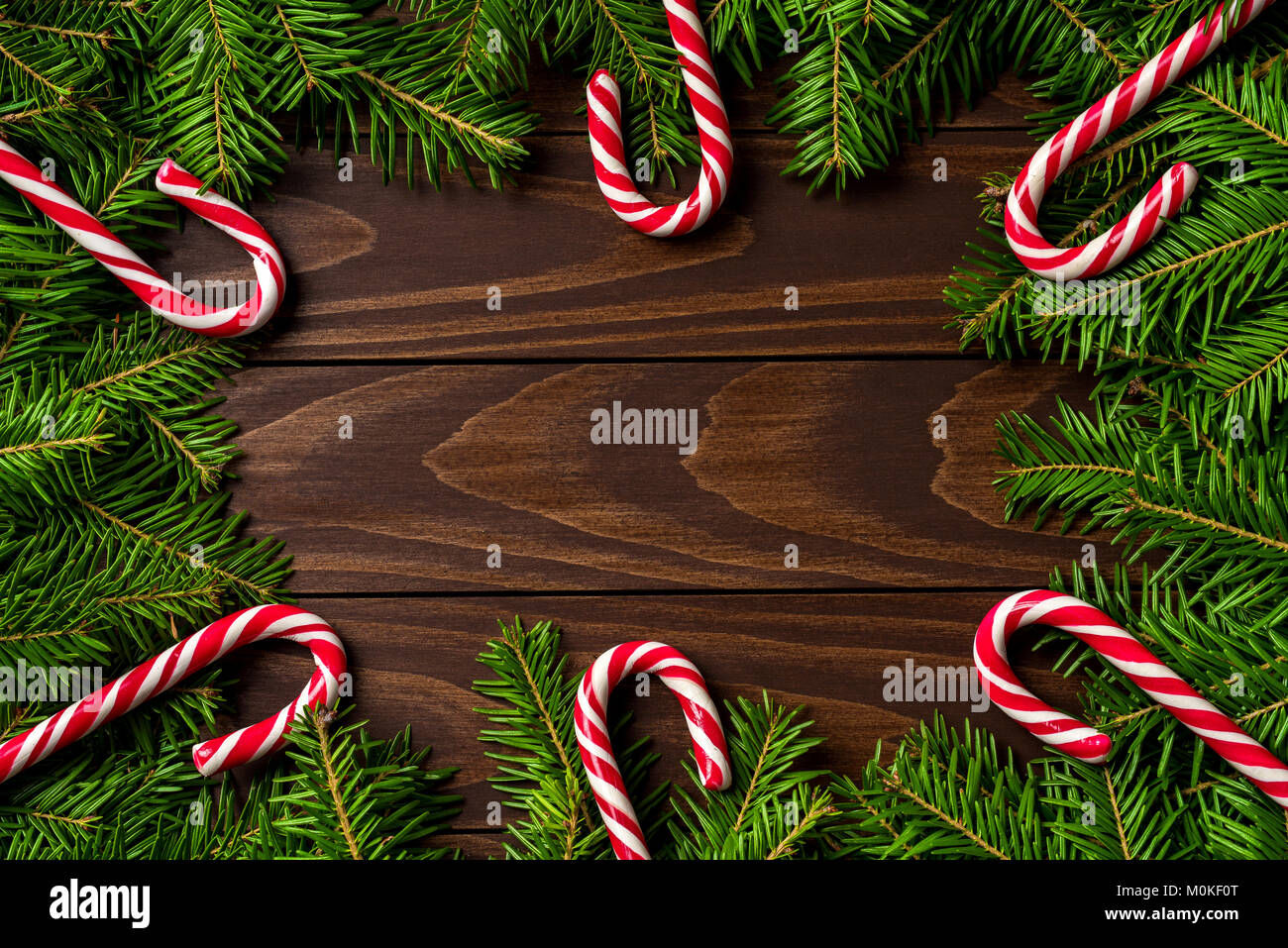 Christmas background with tree and candy canes. Top view Stock Photo