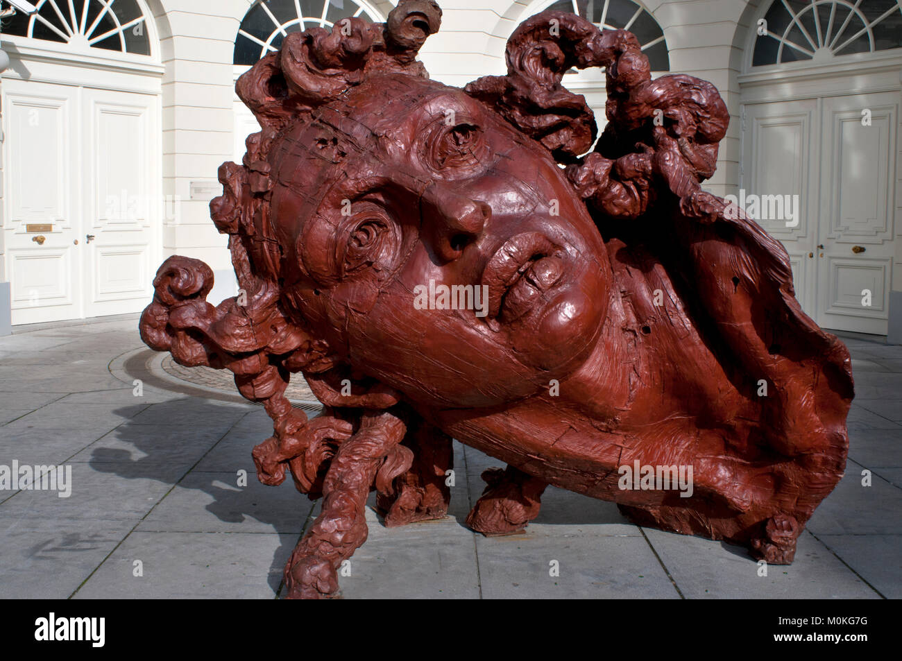 A sculpture from polyester resin by the Mexican artist Javier Marin called  Cabeza de Mujer Roja. The Palais de Charles de Lorraine Musee, Brussels, Be  Stock Photo - Alamy