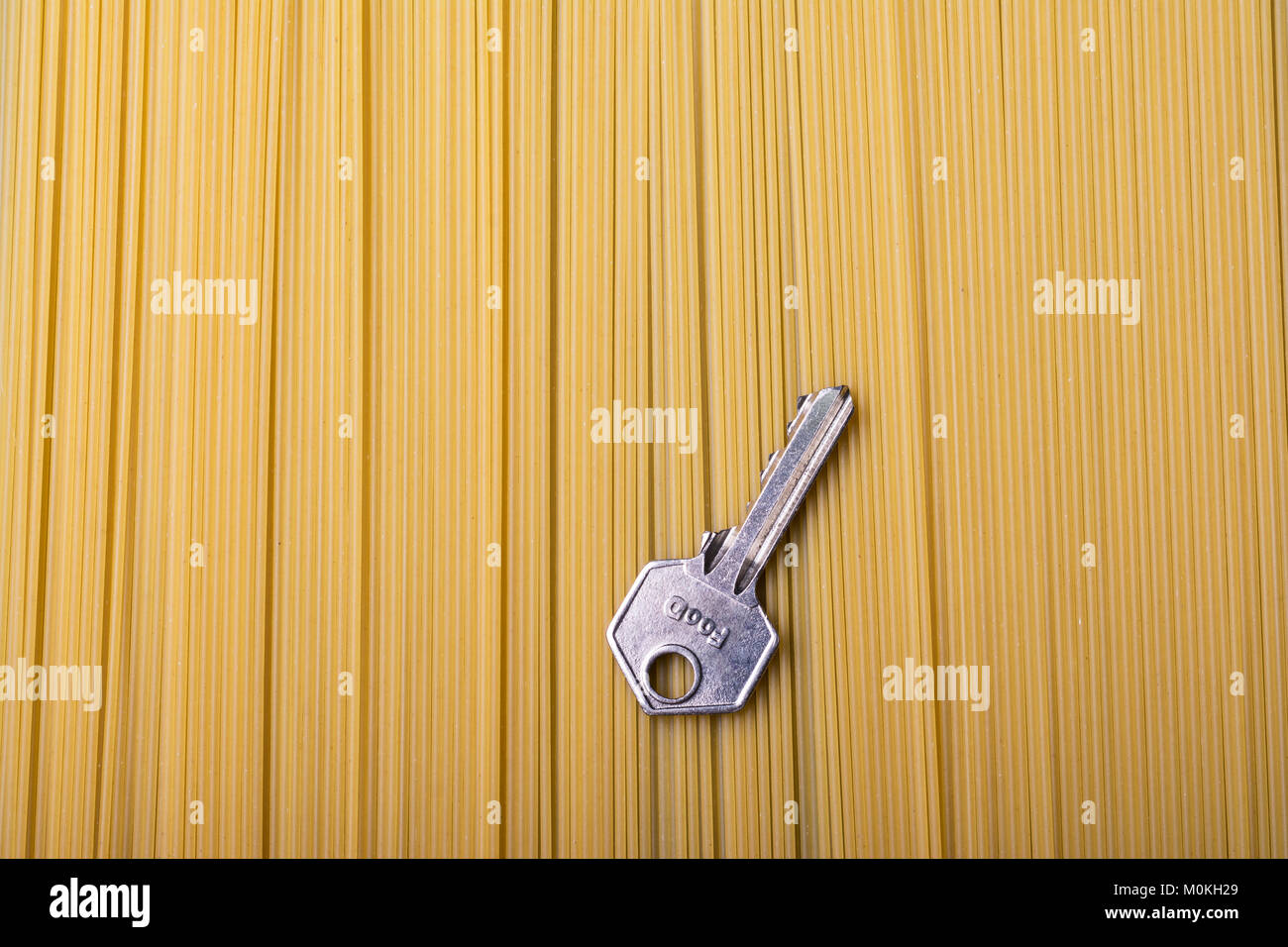 Food key on italian spaghetti close up top view concept. Food Ingredient background. Stock Photo
