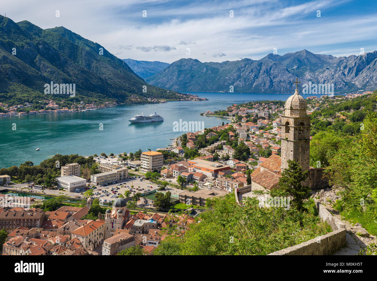Classic panorama view of the historic Church of Our Lady of Remedy overlooking the old town of Kotor and world-famous Bay of Kotor, Montenegro Stock Photo
