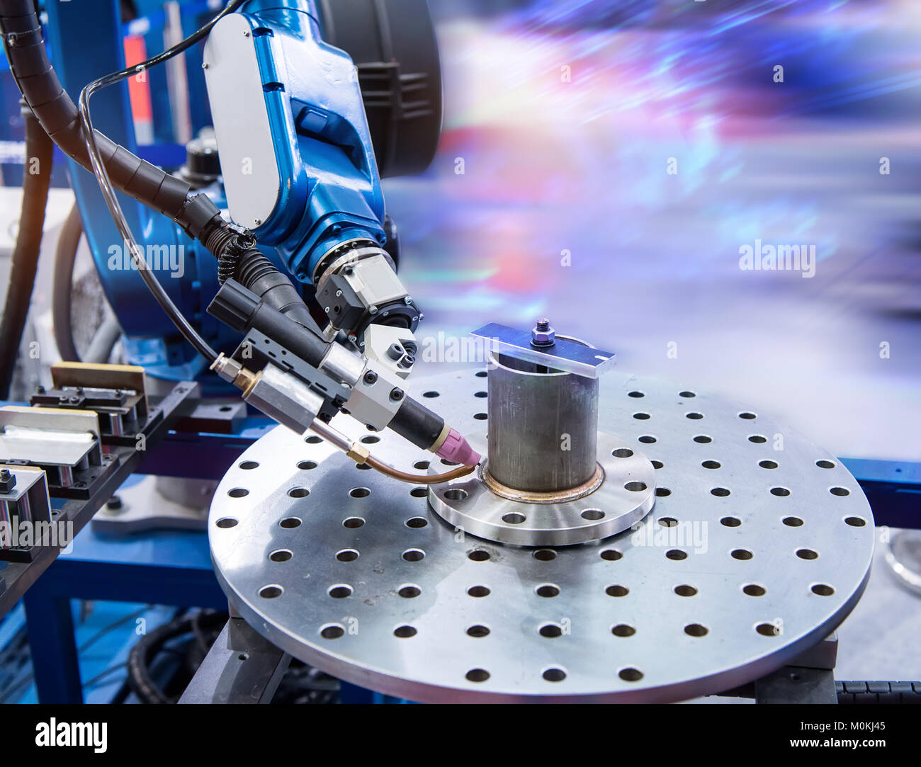 Automatic robotic arm for metal welding operations Stock Photo Alamy