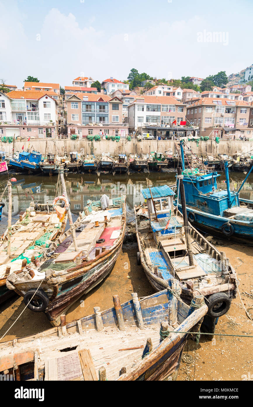 Wooden fishing boats in the village of Shazikou, in the outskirts of Qingdao, Shandong, China Stock Photo