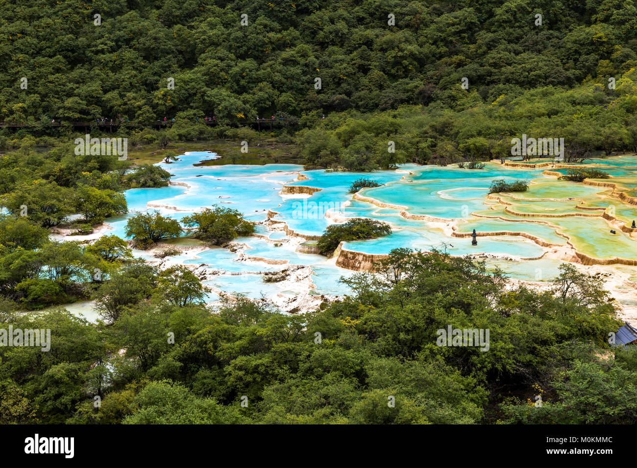 Huanglong National Park, Sichuan, China, famous for its colorful pools formed by calcite deposits. Multi-colored Pond in the picture is the world's la Stock Photo