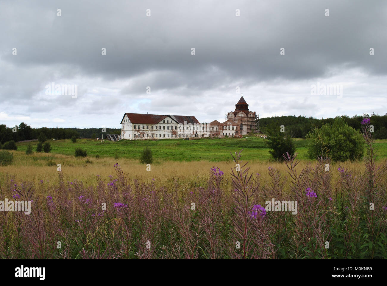 Monastery monastery on the island of Anser. The cell building and the building of the Trinity Church. Russia, Arkhangelsk Region, Solovetsky Islands Stock Photo