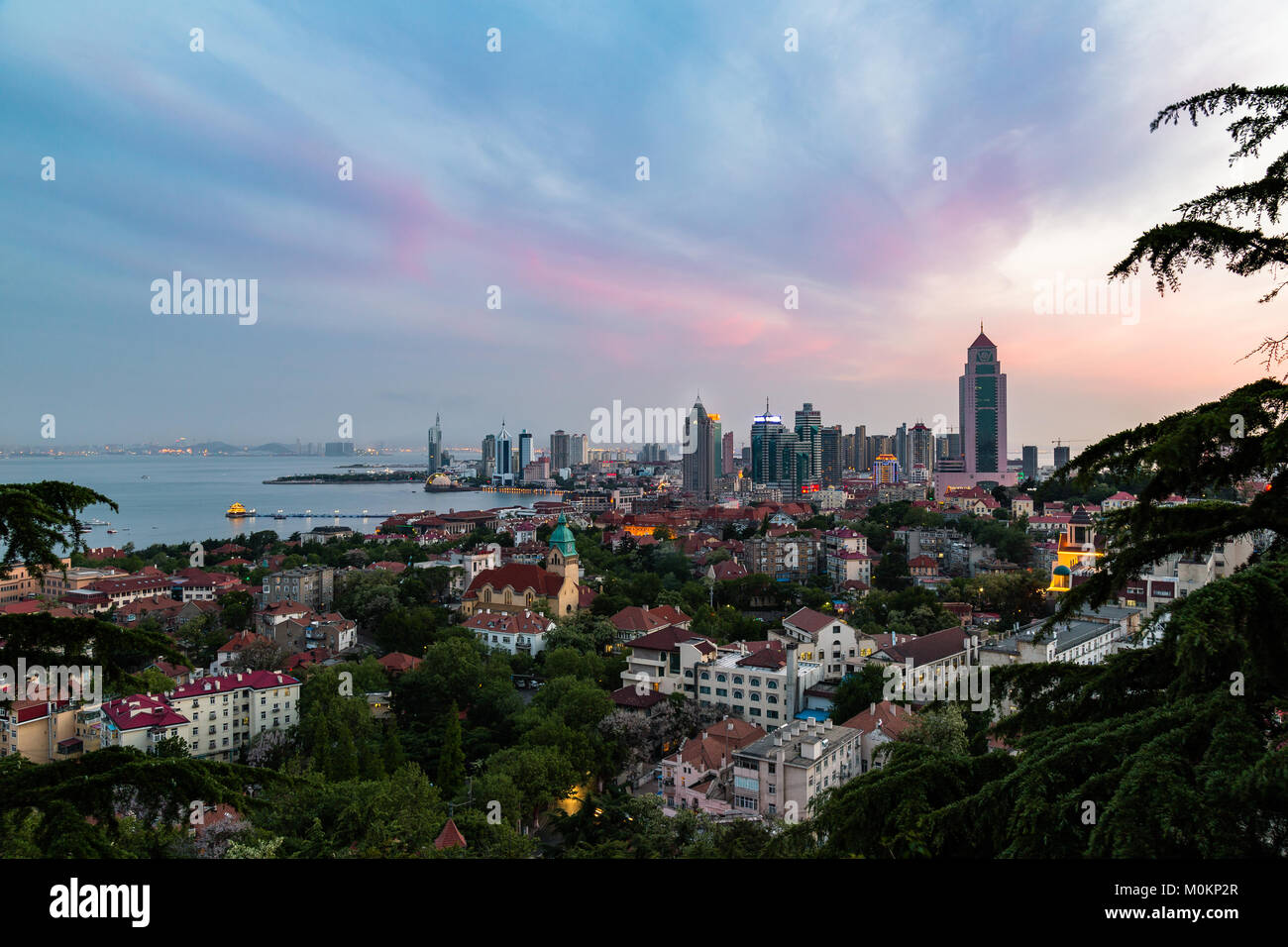 Qingdao Bay and the Lutheran church seen from the hill of Signal Park