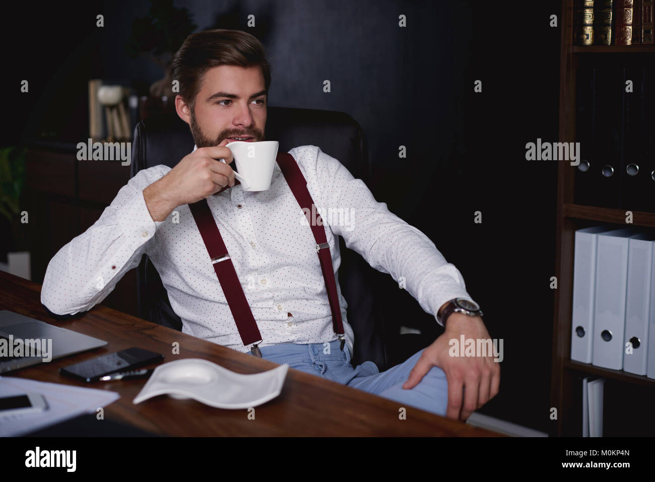 Businessman taking a short break Stock Photo - Alamy