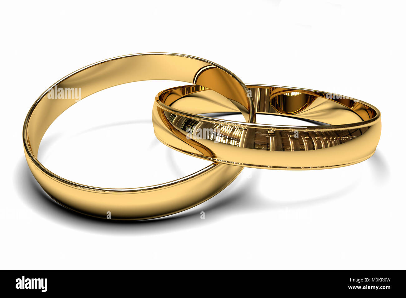 two wedding rings made of gold, interlaced with each other, to represent love and unity Stock Photo