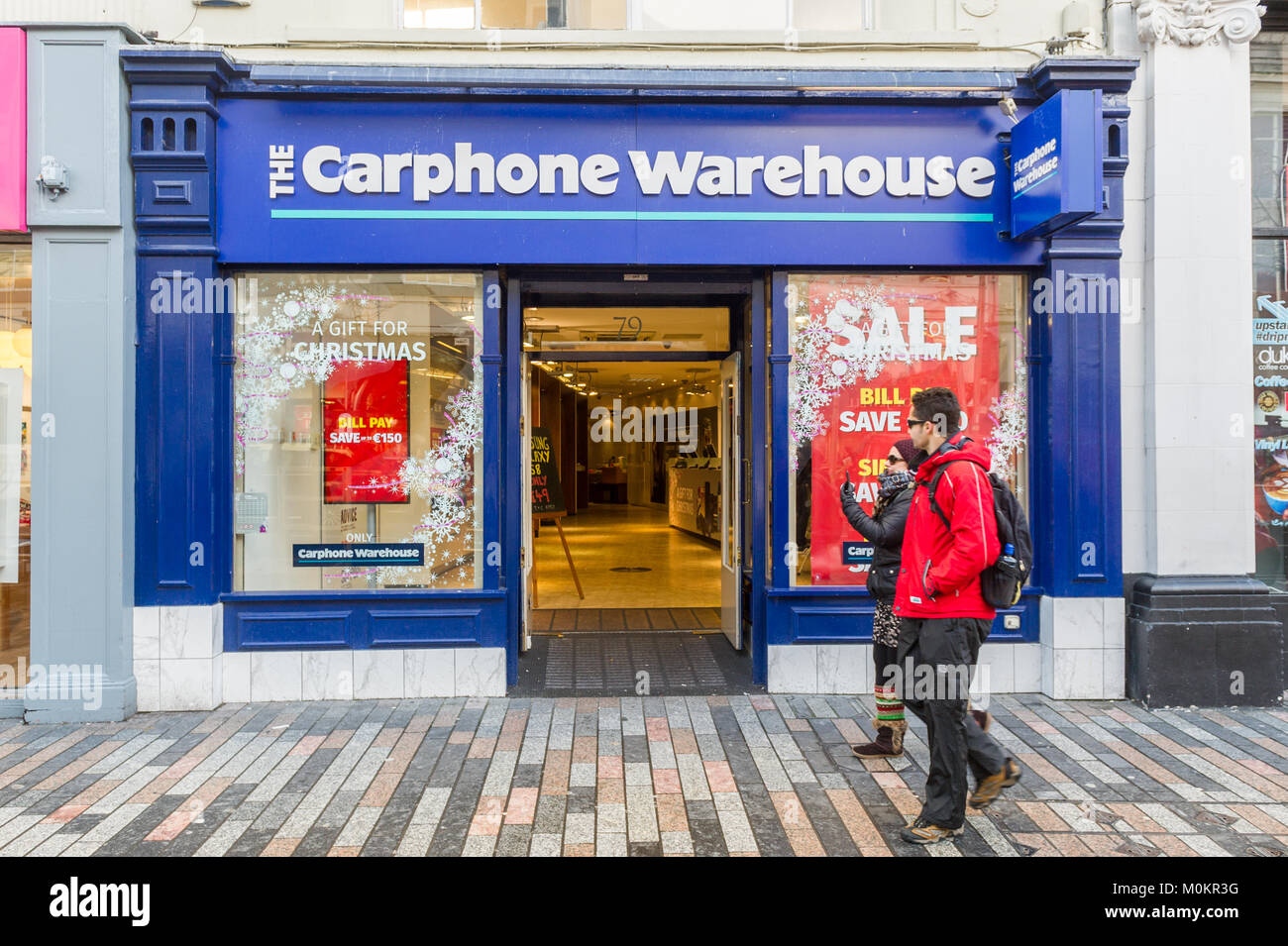 Carphone Warehouse mobile phone shop on Patrick Street, Cork, Ireland with shoppers in the January sales. Stock Photo