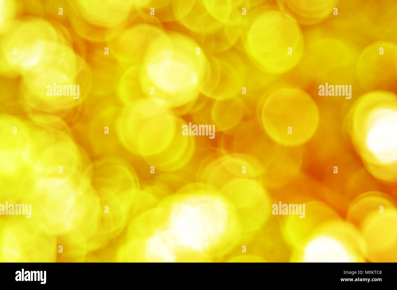 Bokeh abstract gold light background Stock Photo - Alamy