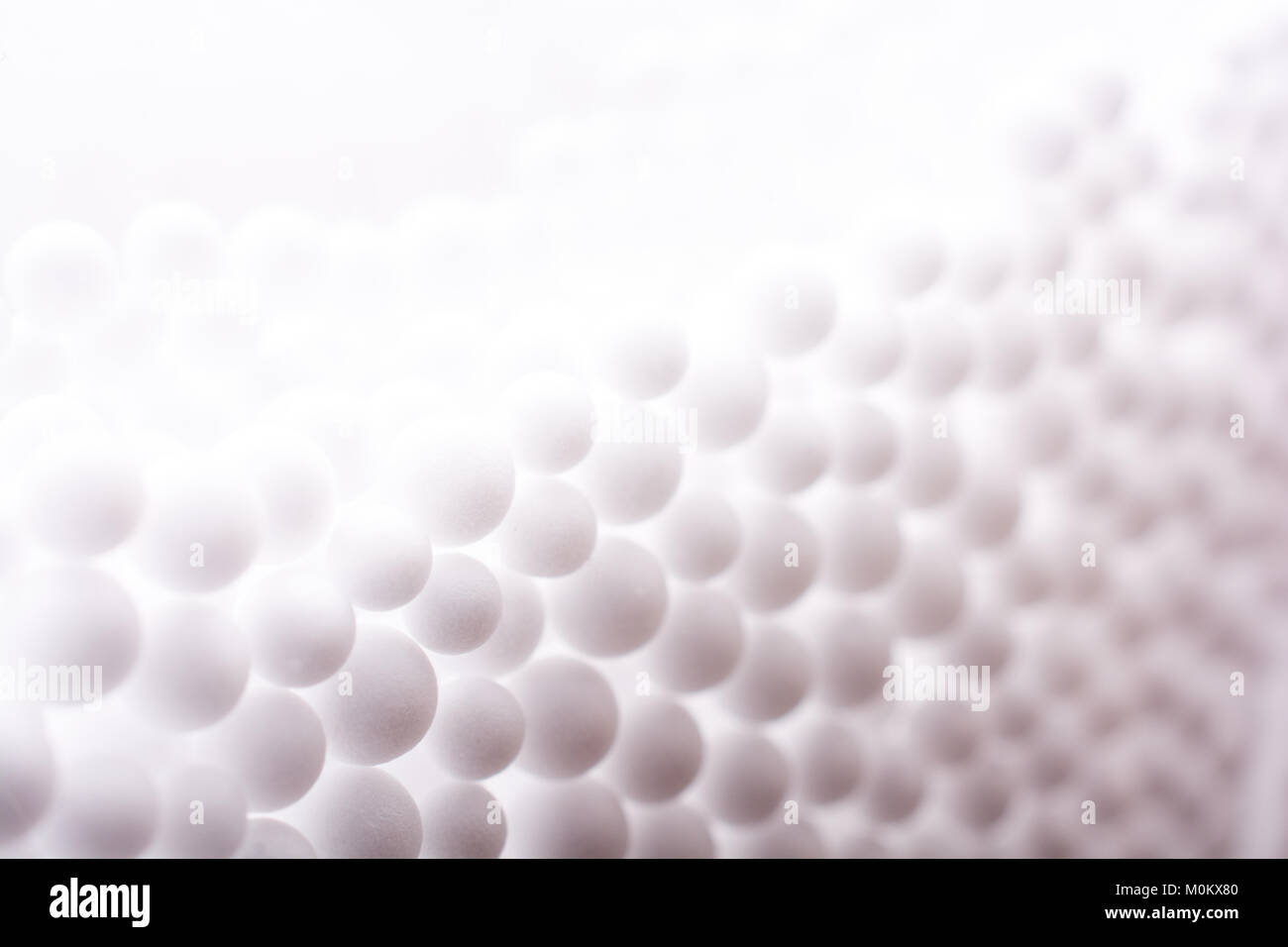 White little polystyrene foam balls as background Stock Photo - Alamy