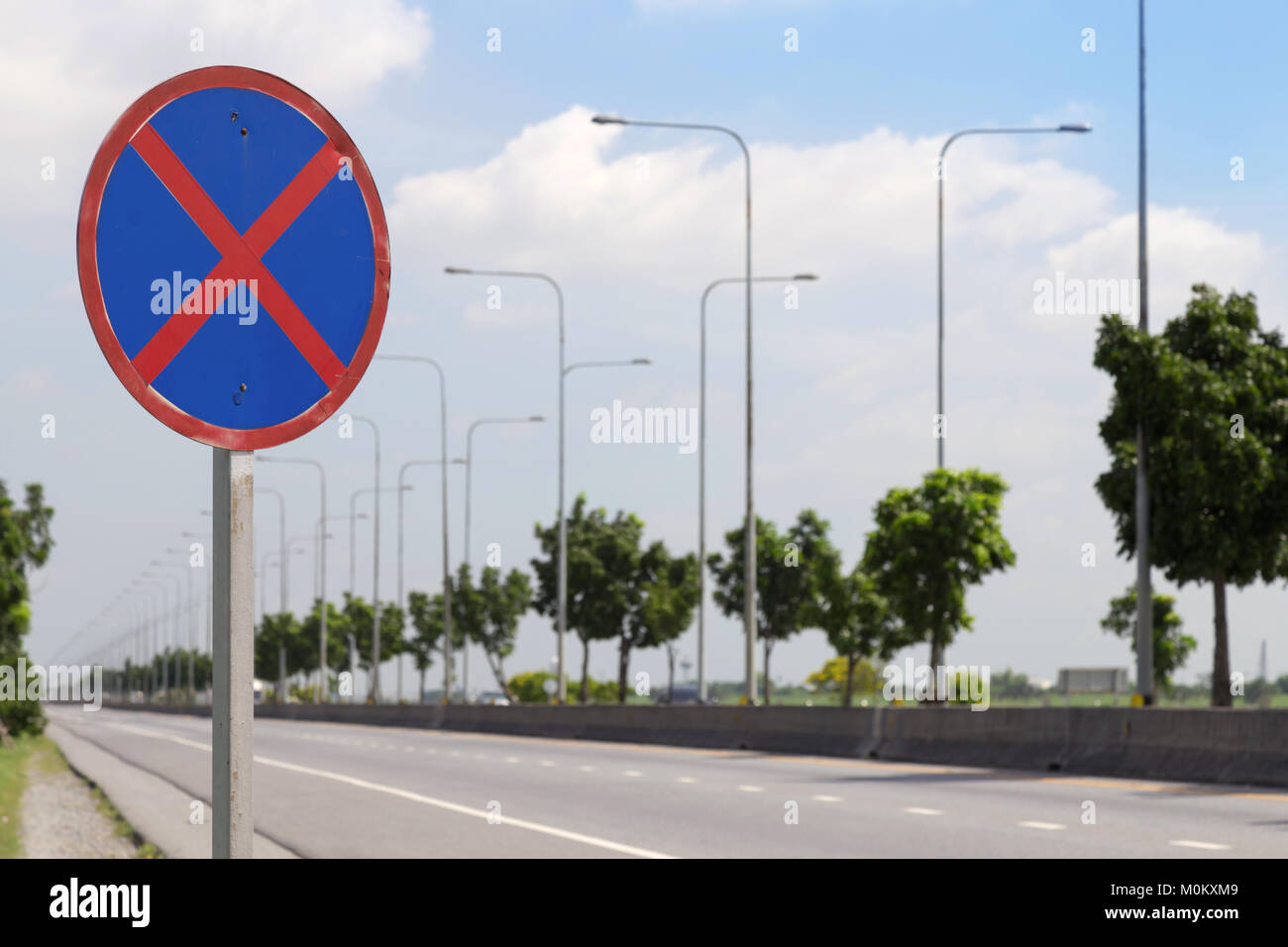 no stopping road sign on the road and the blue sky background Stock ...
