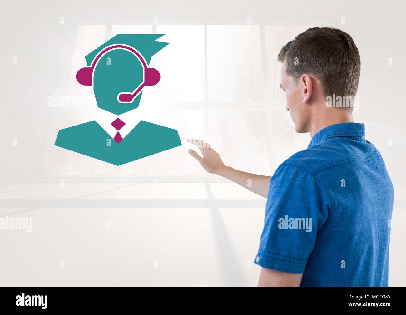 Man interacting with customer service icon Stock Photo