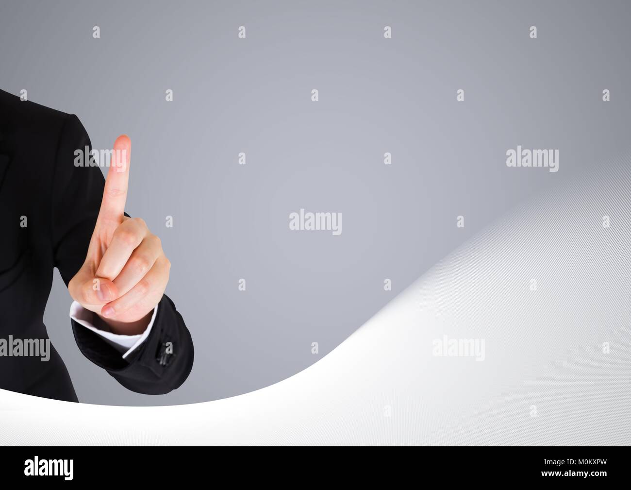 Hand Point Grey Hand pointing with grey background Stock Photo - Alamy