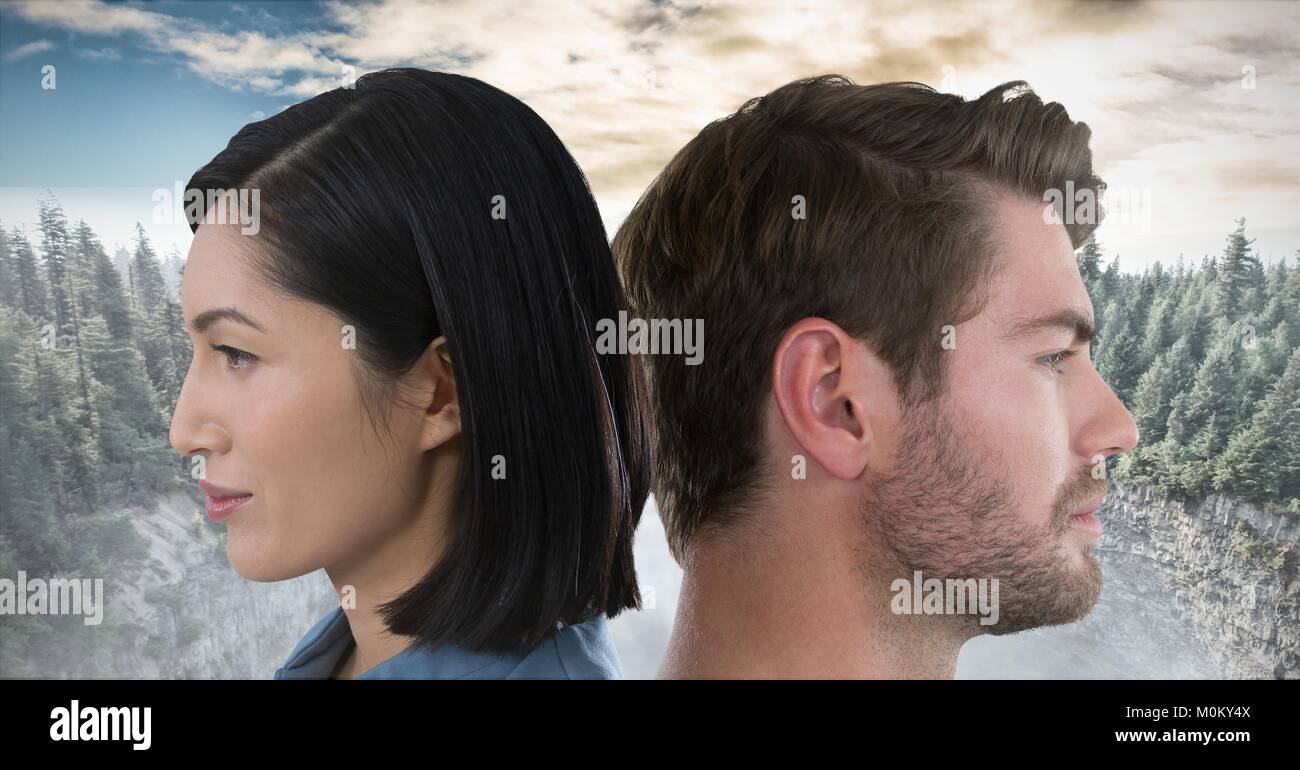 Woman and man back to back with nature behind Stock Photo