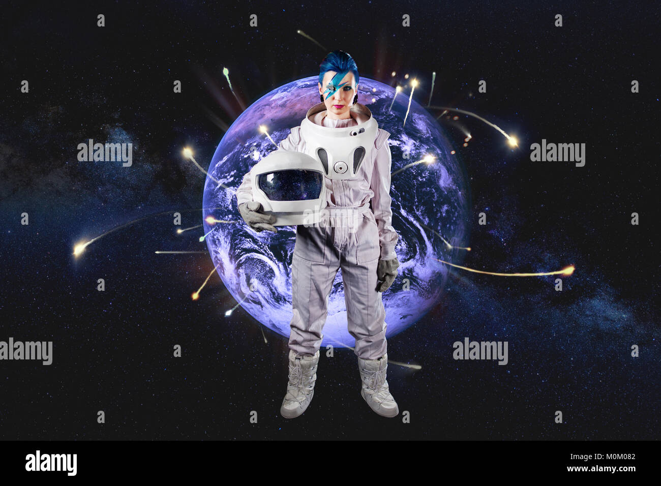 Fantastic astronaut on the background of the planet Earth. Elements of this image furnished by NASA. Stock Photo