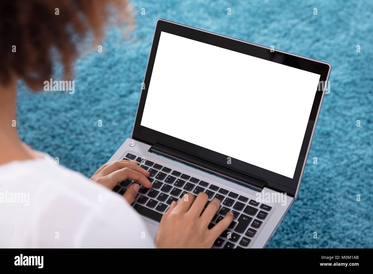 Close-up Of A Woman Using Laptop With Blank White Screen Stock Photo ...