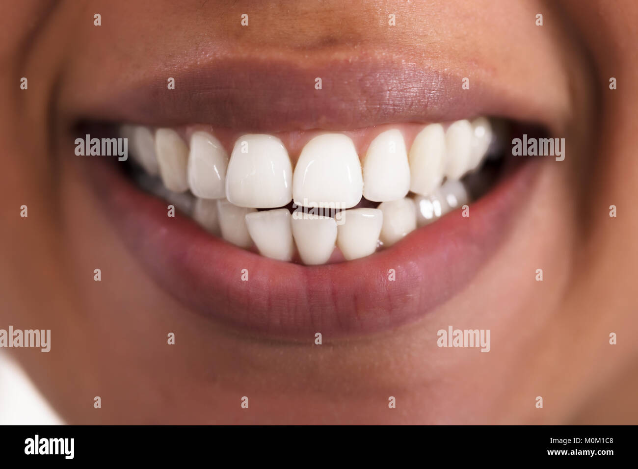 Close-up Of Happy Woman With Healthy White Teeth Stock Photo