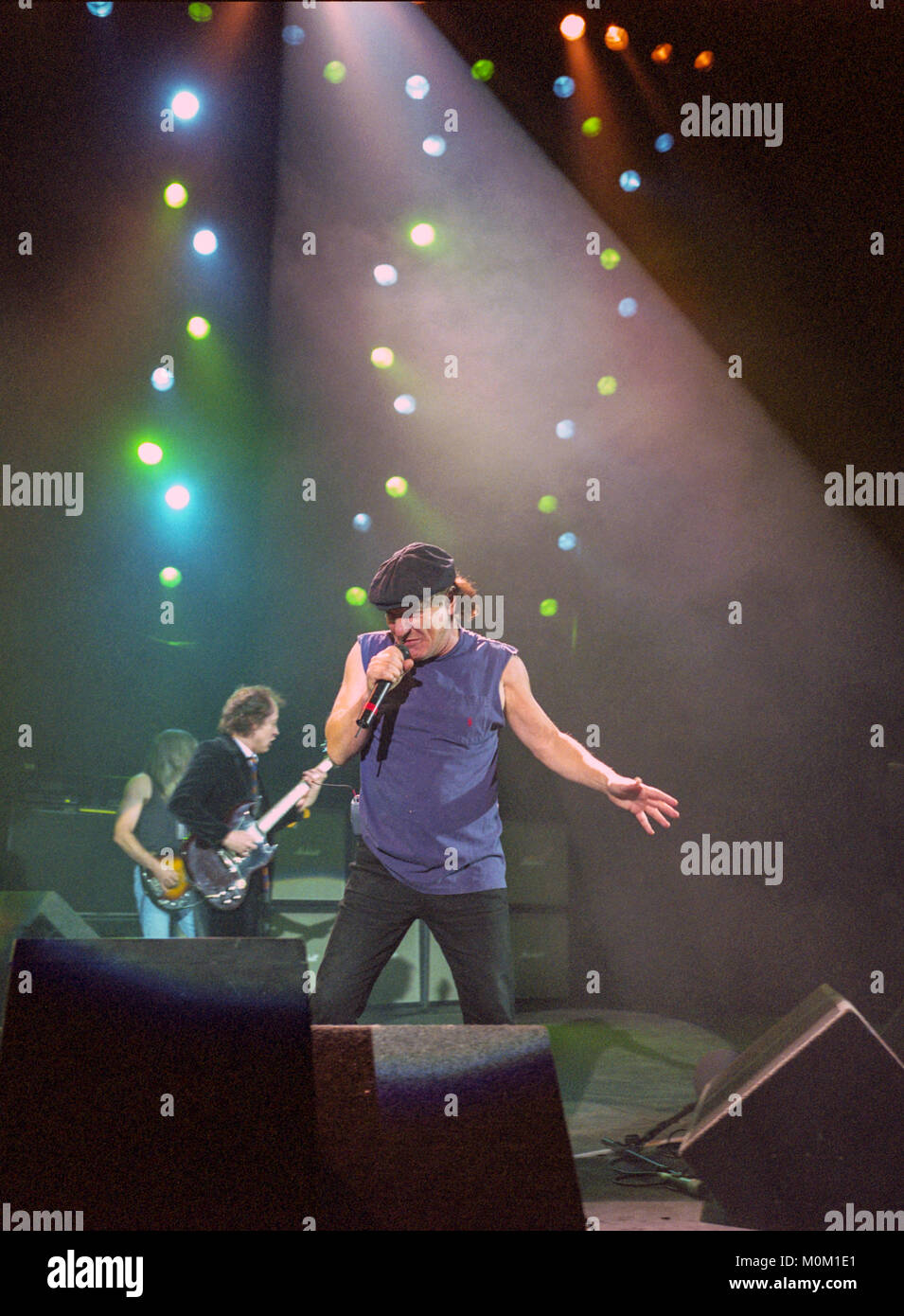 Brian Johnson and Angus Young of Australian Rock group AC/DC performing at the Hammersmith Apollo. 21st October 2003, London, England, United Kingdom. Stock Photo