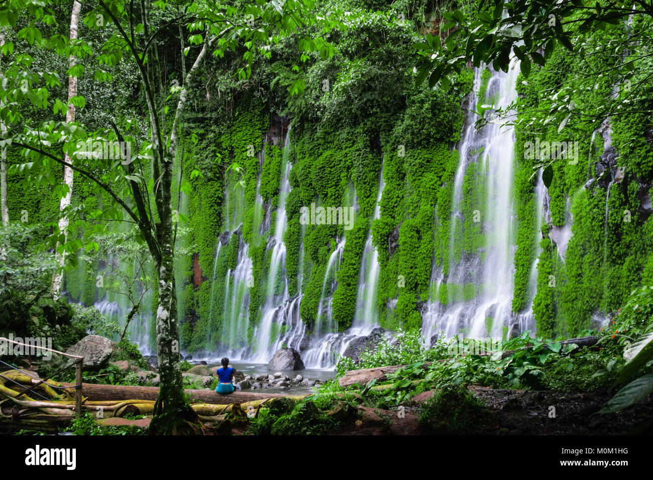 After an hour of habal-habal ride and 500+ steps, this astonishing scene welcomed us. Asik asik Falls Stock Photo