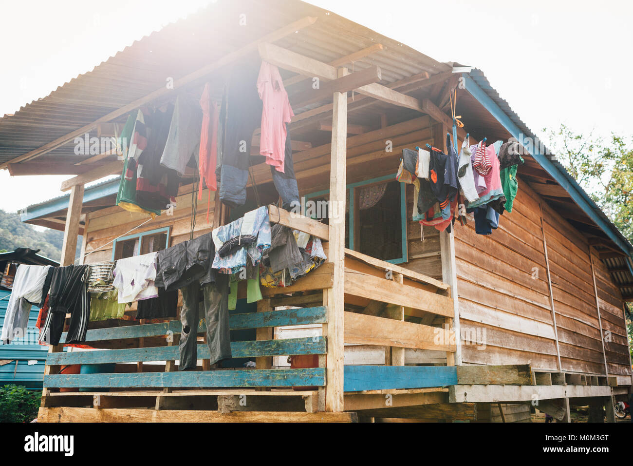 Laundry day at small village in borneo Stock Photo Alamy