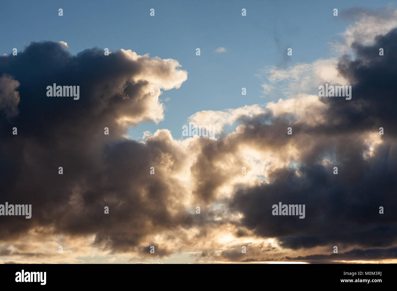 Dark clouds on blue sky at evening Stock Photo - Alamy