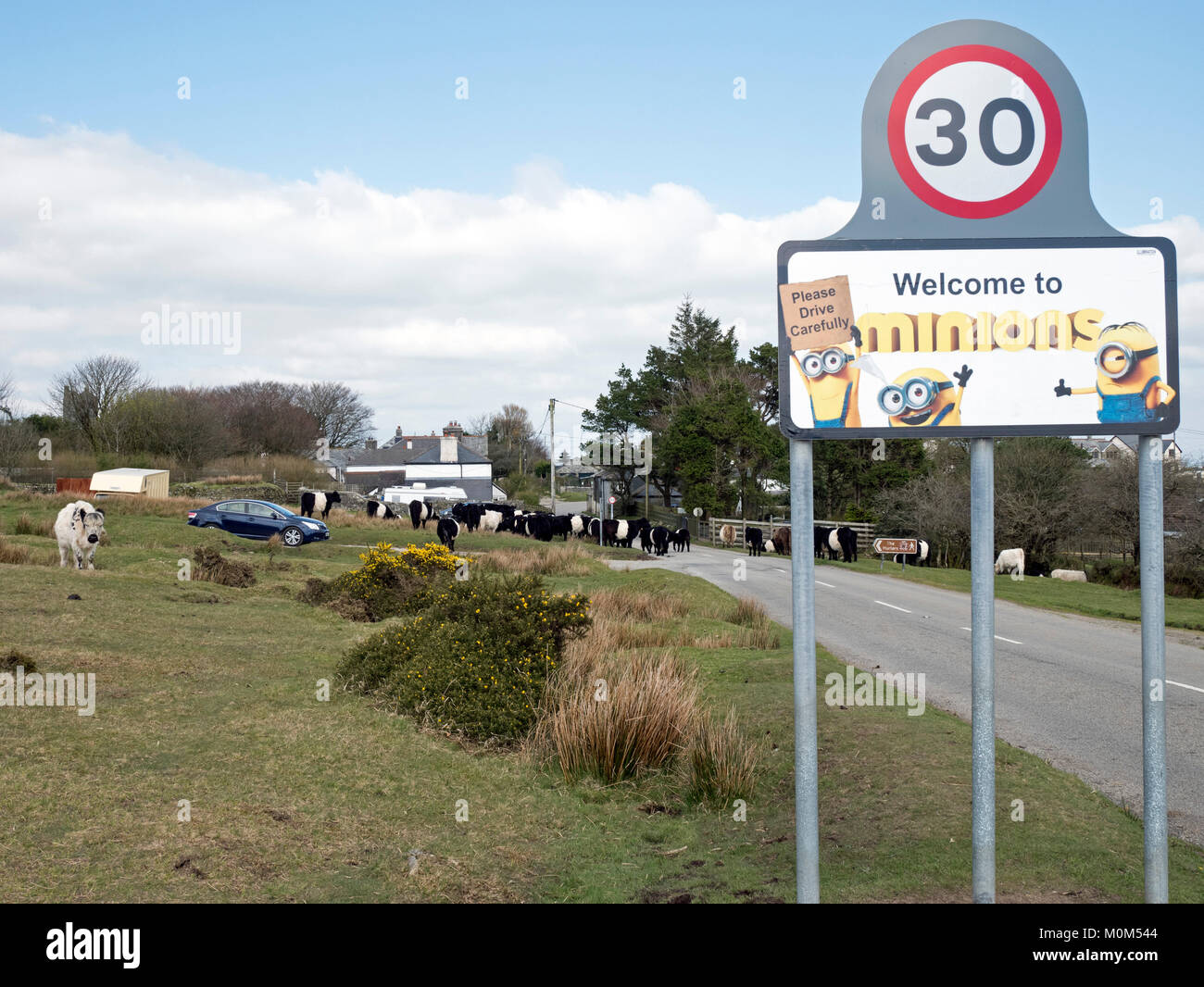 Sign welcoming visitors to the village of Minions on Bodmin Moor, Cornwall Stock Photo