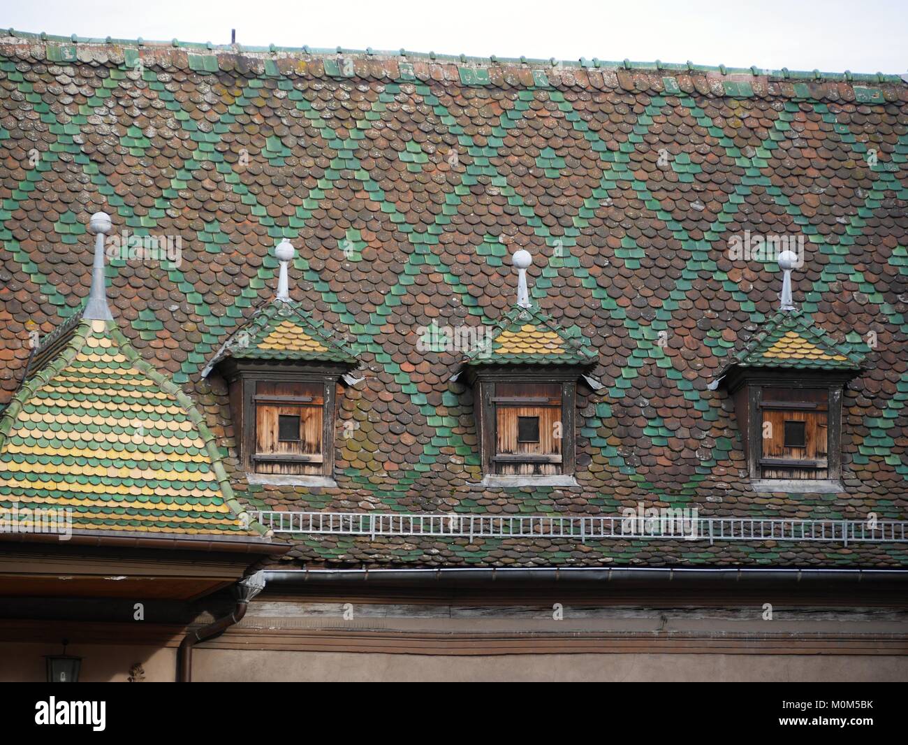 Colourful tiled roof of St Martin's Church, Colmar, Alsace, France Stock Photo