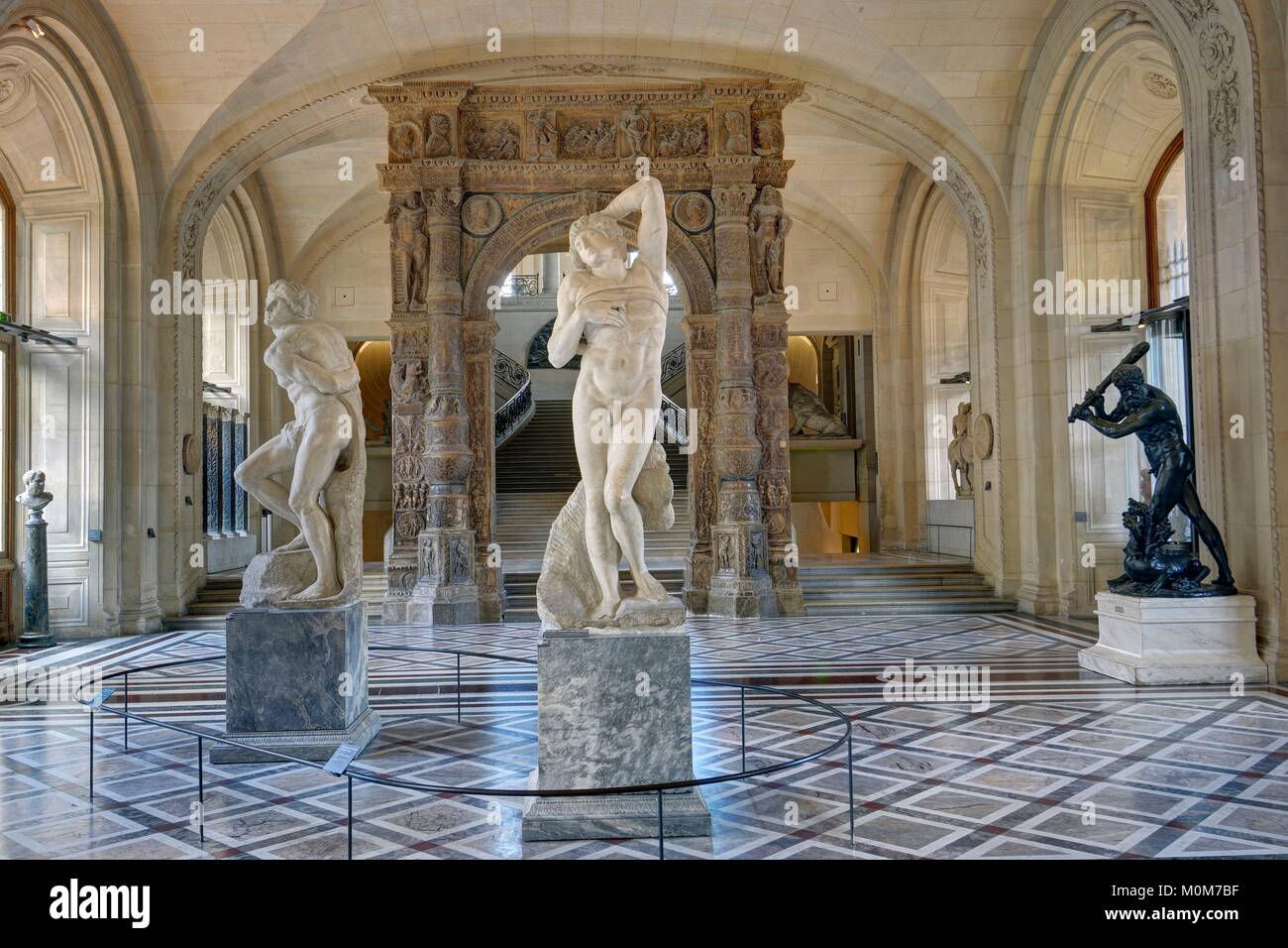 France,Paris,area listed as World Heritage by UNESCO,Louvre museum,foreign sculptures department,Mollien gallery with two Slaves carved by Michel Angelo circa 1513 Stock Photo