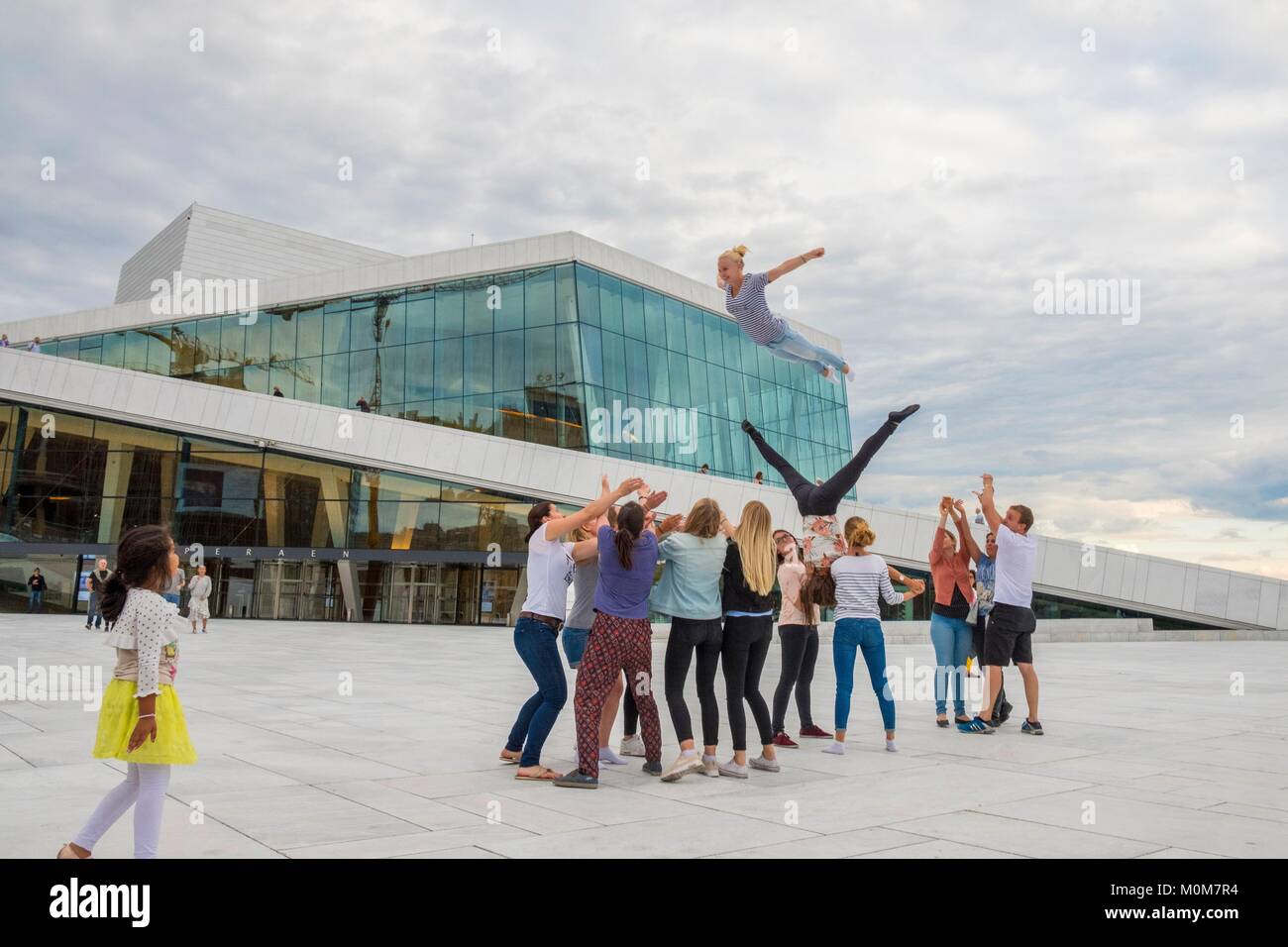 Norway,Oslo,Bjorvika Dock District,Opera by architect Tarald Lundevall,Female Gymnastics Demonstration Team Stock Photo