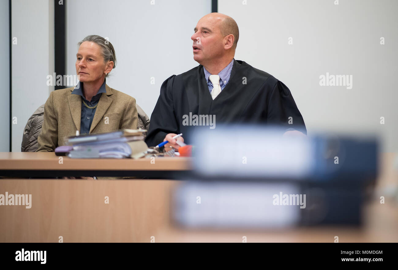 The defendant Susanne S-R (L) is on the dock next to her lawyer Detlev Stoecker at the district court in Warendorf, Germany, 22 January 2018. At the trial against the managers of the rural stud Warendorf the three former civil servants are accused of travelling to a tournament in Qatar with their spouses 2013 and 2014. A Qatari equestrian sport facility, which maintained a business relationship with the rural stud, is accused of having paid the 49.000 euro trip. The responsible North Rhine-Westphalian Agricultural Ministry did not know from the travels. Photo: Guido Kirchner/dpa Stock Photo