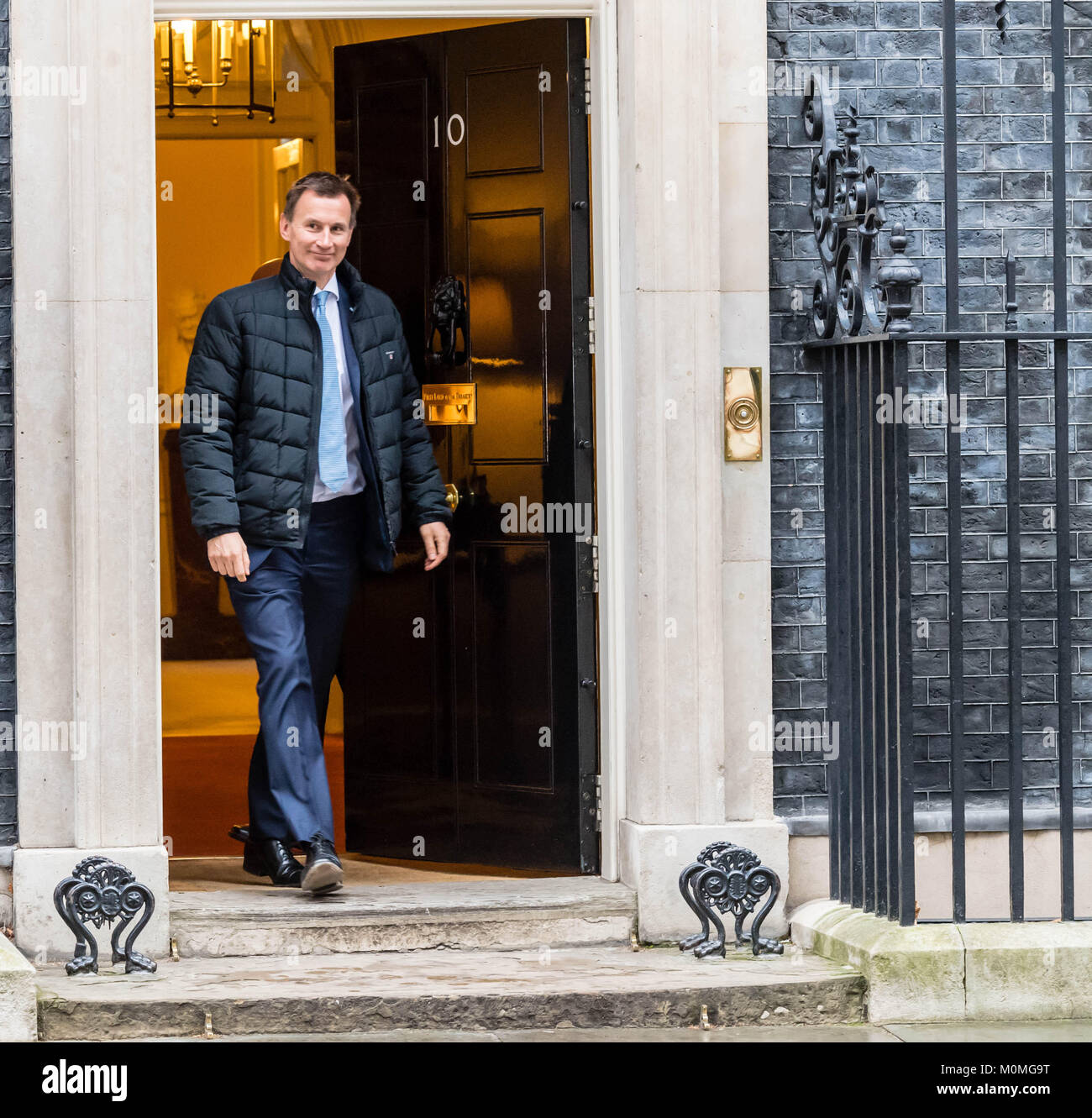 London, UK. 23rd January, 2018. Jeremy Hunt, Health Secretary leaves 10 Downing Street following a cabinet meeting.  He refused to answers reporters questions on Boris Johnson's initiative on NHS funding including a question 'Is Boris during your job now?' Credit: Ian Davidson/Alamy Live News Stock Photo