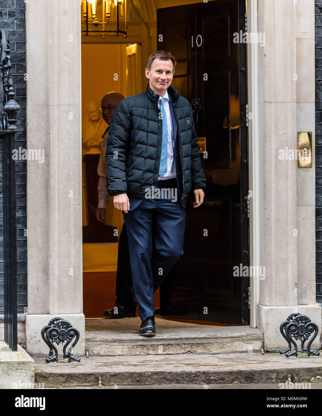 London, UK. 23rd January, 2018. Jeremy Hunt, Health Secretary leaves 10 Downing Street following a cabinet meeting.  He refused to answers reporters questions on Boris Johnson's initiative on NHS funding including a question 'Is Boris during your job now?' Credit: Ian Davidson/Alamy Live News Stock Photo