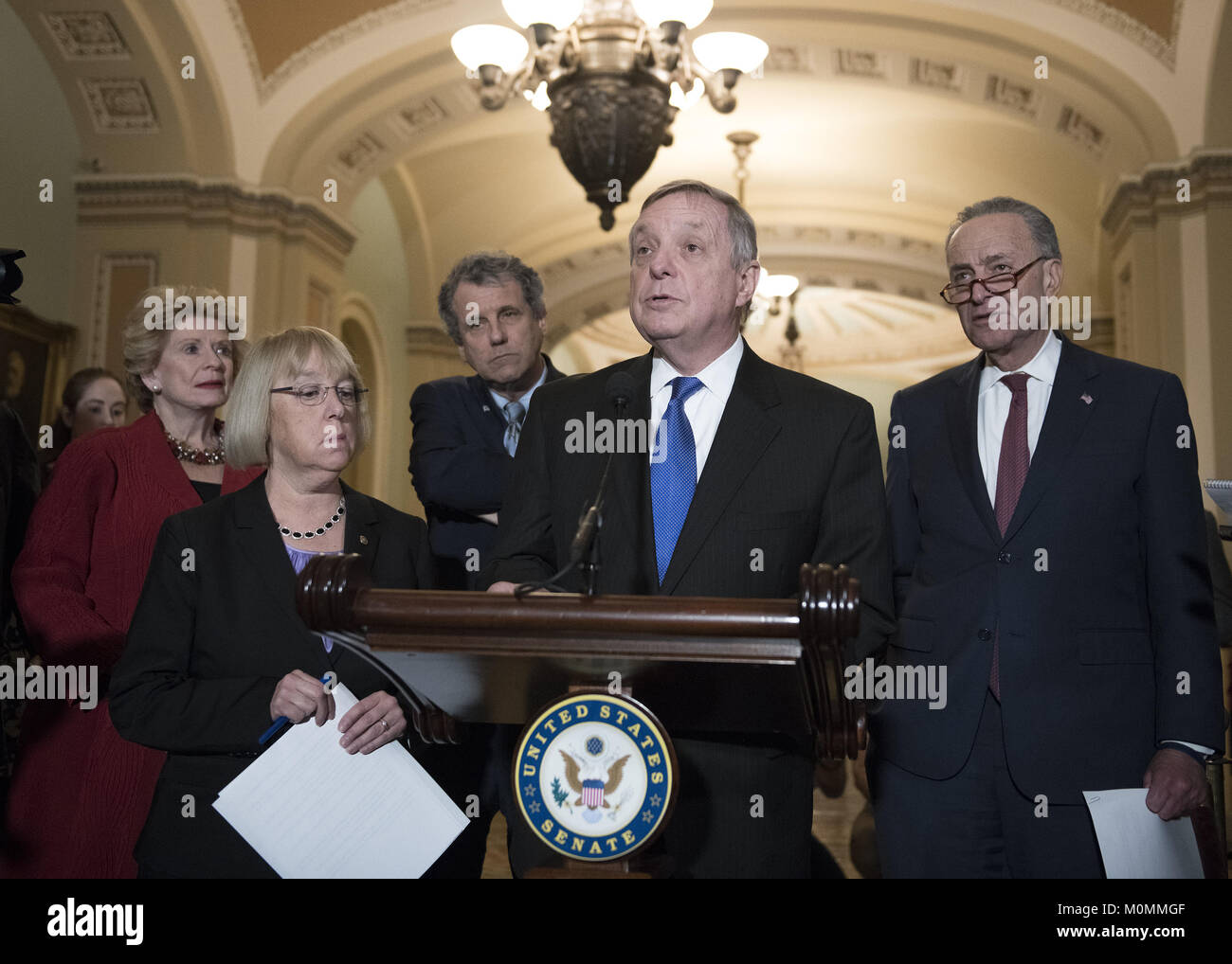 Washington, District of Columbia, USA. 23rd Jan, 2018. United States Senator Dick Durbin (Democrat of Illinois) makes remarks following the Democratic Party policy luncheon in the US Capitol in Washington, DC on Tuesday, January 23, 2018. From left to right: US Senator Debbie Stabenow (Democrat of Michigan), US Senator Patty Murray (Democrat of Washington), US Senator Sherrod Brown (Democrat of Ohio), Senator Durbin, and US Senate Majority Leader Chuck Schumer (Democrat of New York).Credit: Ron Sachs/CNP Credit: Ron Sachs/CNP/ZUMA Wire/Alamy Live News Stock Photo